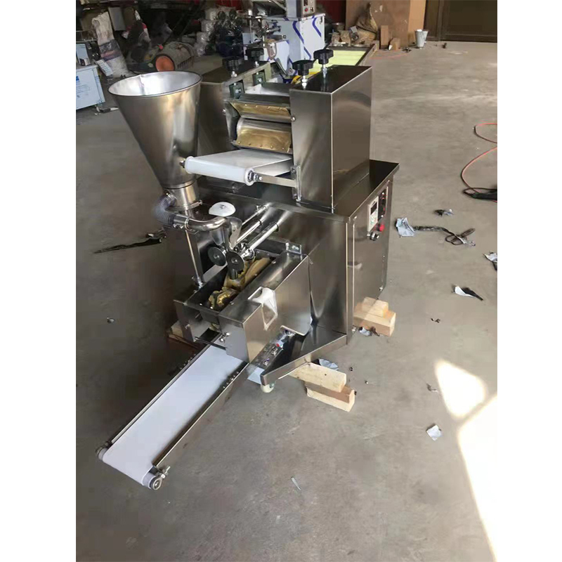 Automatic dumpling making machine